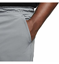 Nike Dri-FIT Unlimited 9" M - pantaloni fitness - uomo, Grey